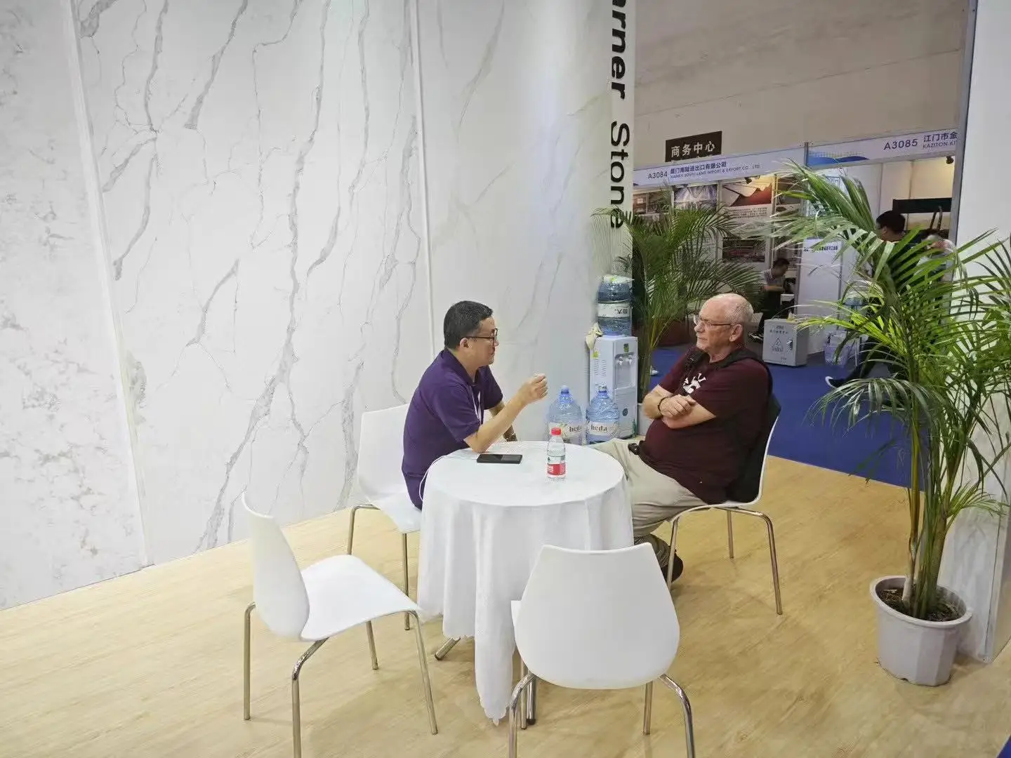 One-on-one commercial negotiation between Warner sales director and global buyer