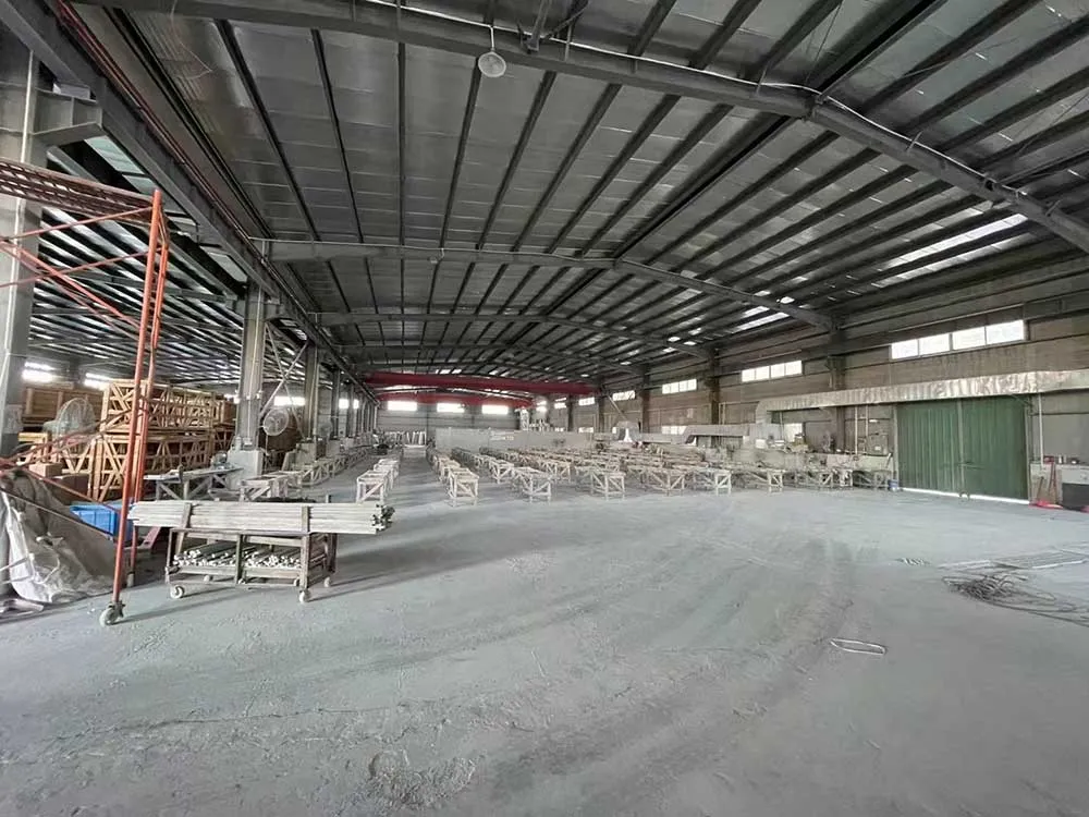 Heavy fabrication workshop hall with organized countertop cutting sawhorses
