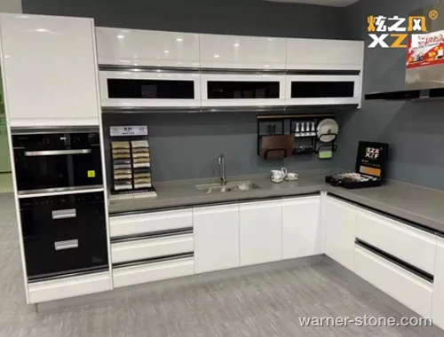 Sleek solid grey stain-resistant quartz countertop on modern cabinetry