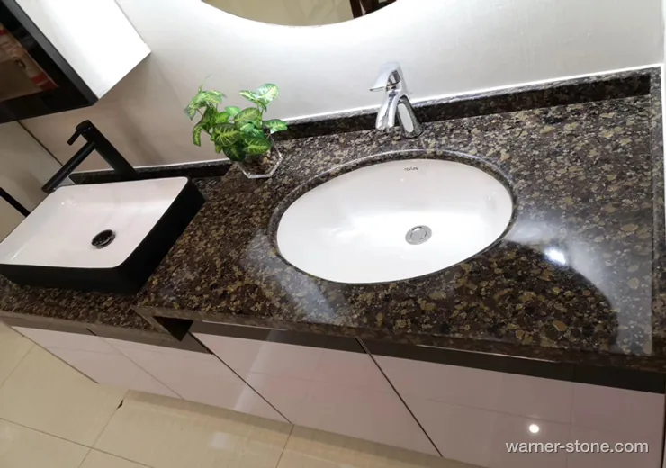 Commercial hotel washroom top in dark bronze crystalline quartz with seamless undermount basin cutout