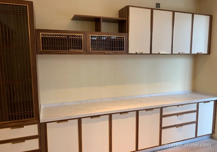 Walnut dining sideboard topped with Warner Calacatta veined quartz slab