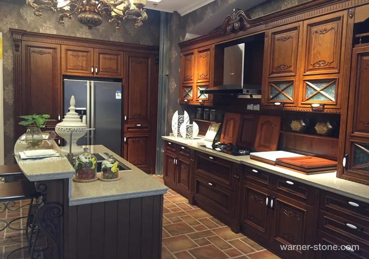 Classic walnut cabinetry paired with warm beige quartz countertop featuring multi-step decorative ogee edge profile