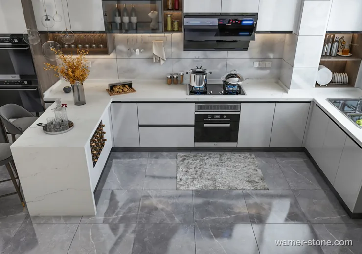 Panoramic view of open luxury kitchen with seamless U-shaped quartz tops and wine-rack island