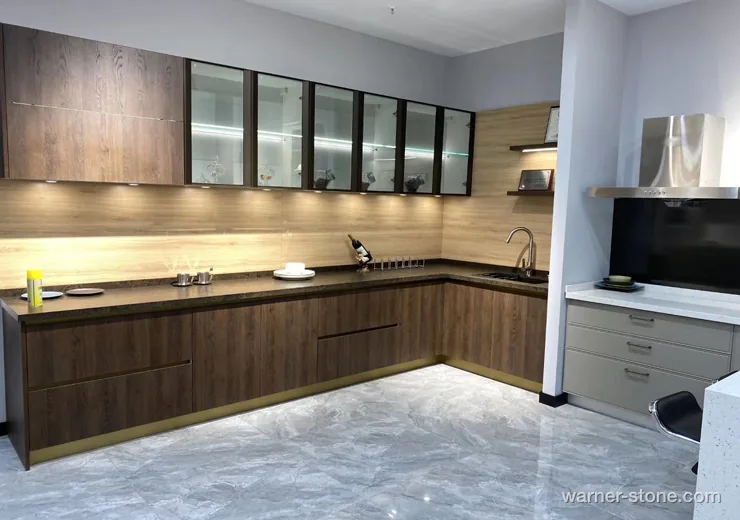 L-shaped kitchen cabinetry with vintage leathered brown quartz countertop
